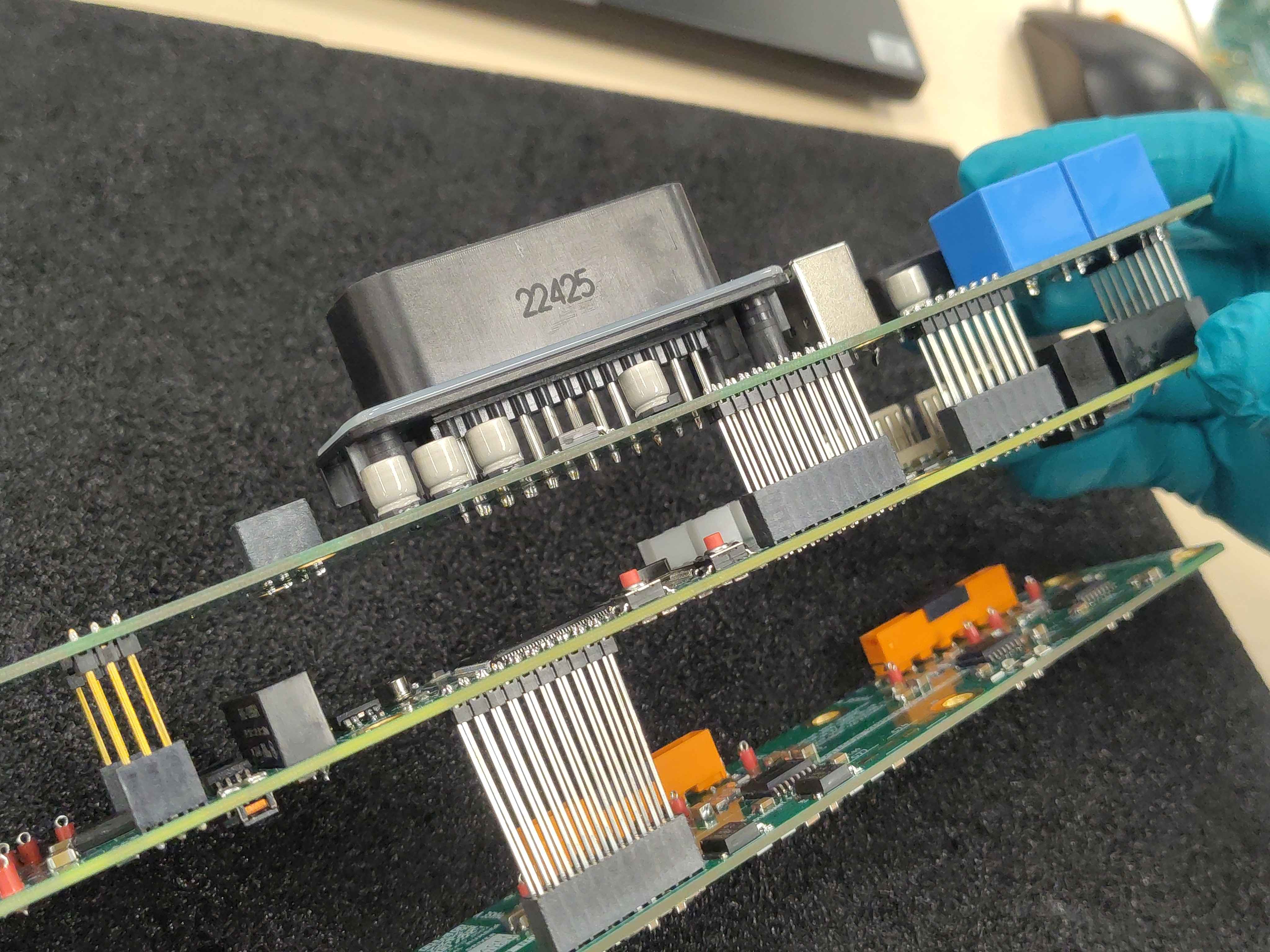 Fully inserted three-board assembly