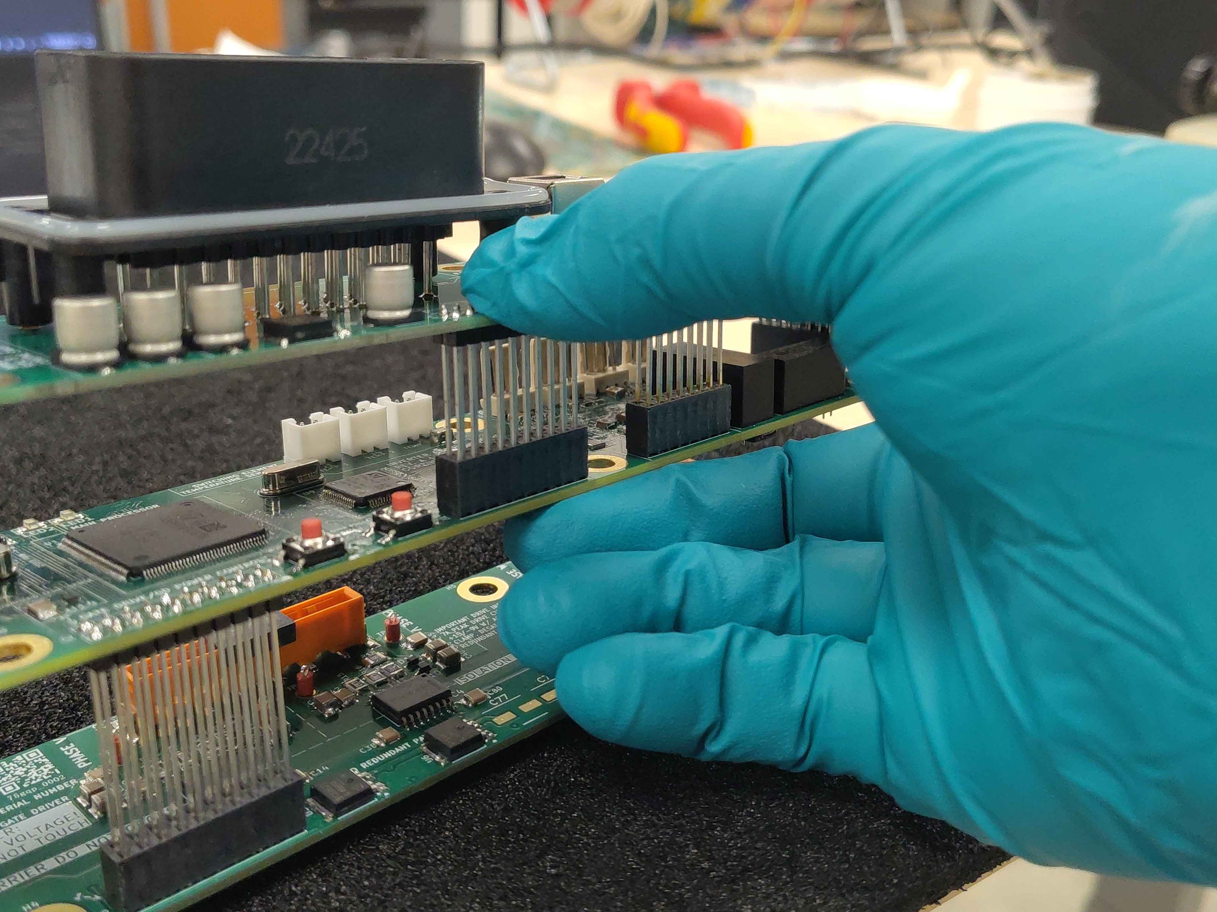 Seating the IO-board connector into the control board