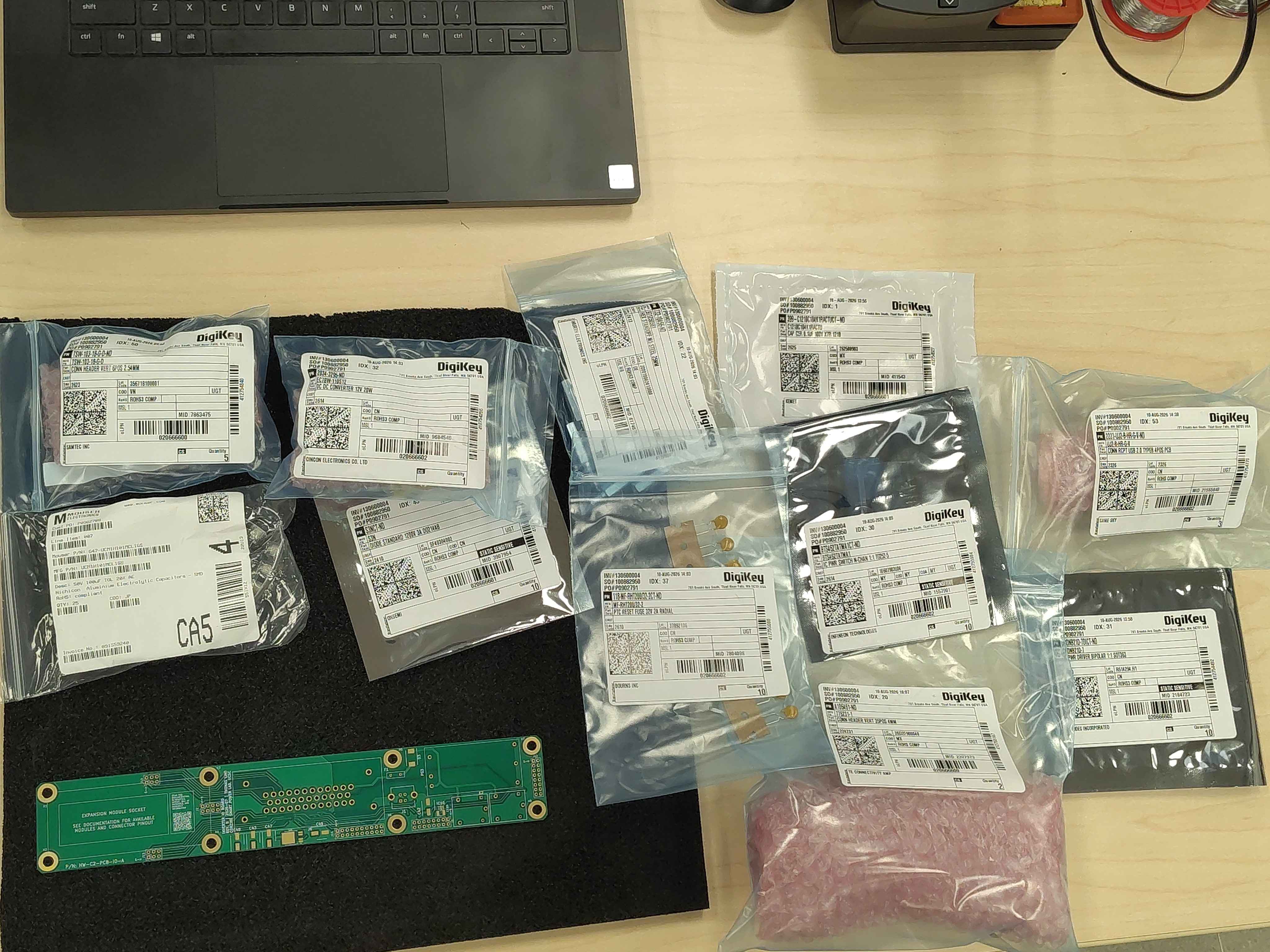 IO board parts laid out for assembly