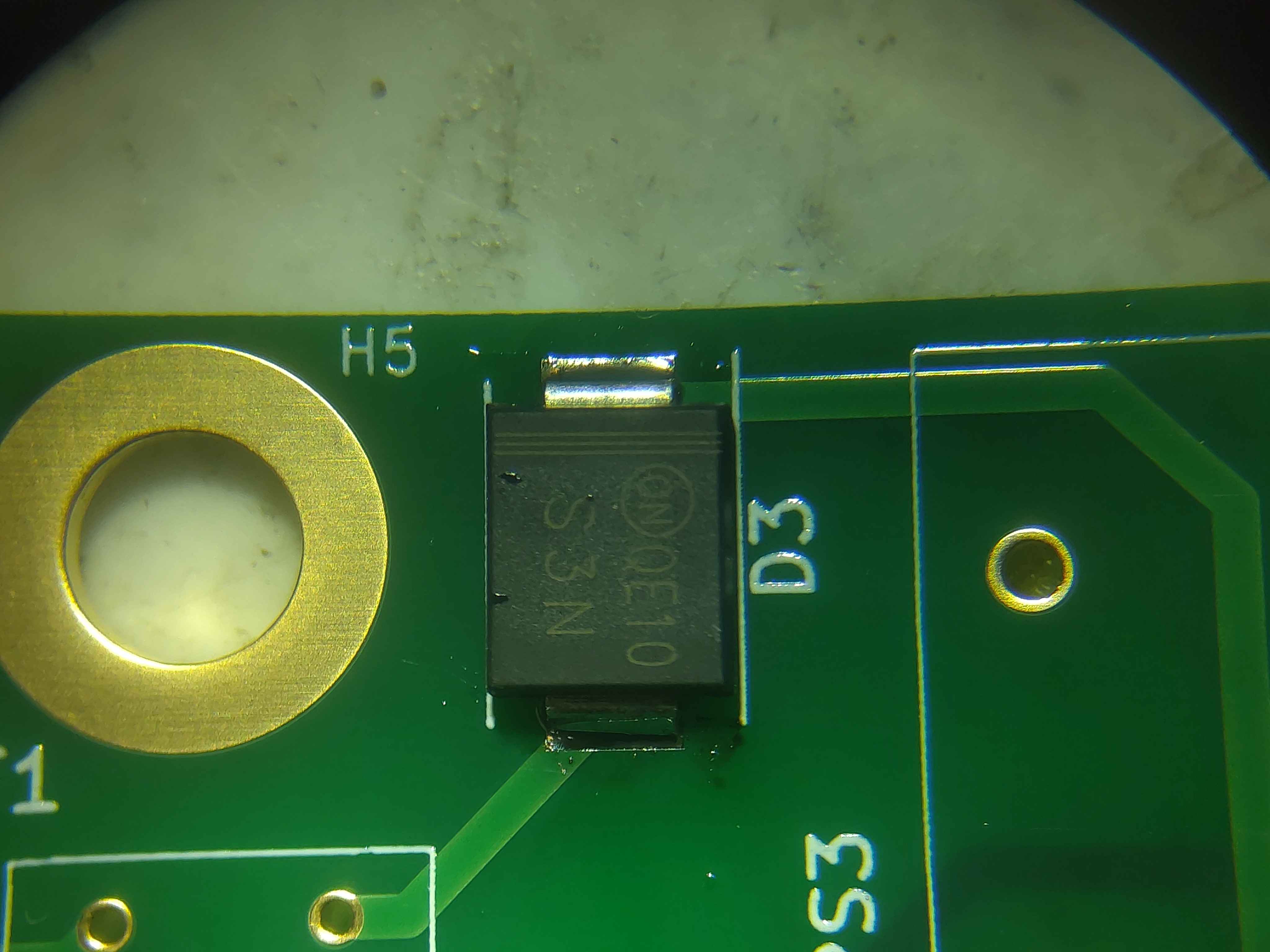 A soldered diode with polarity correctly aligned