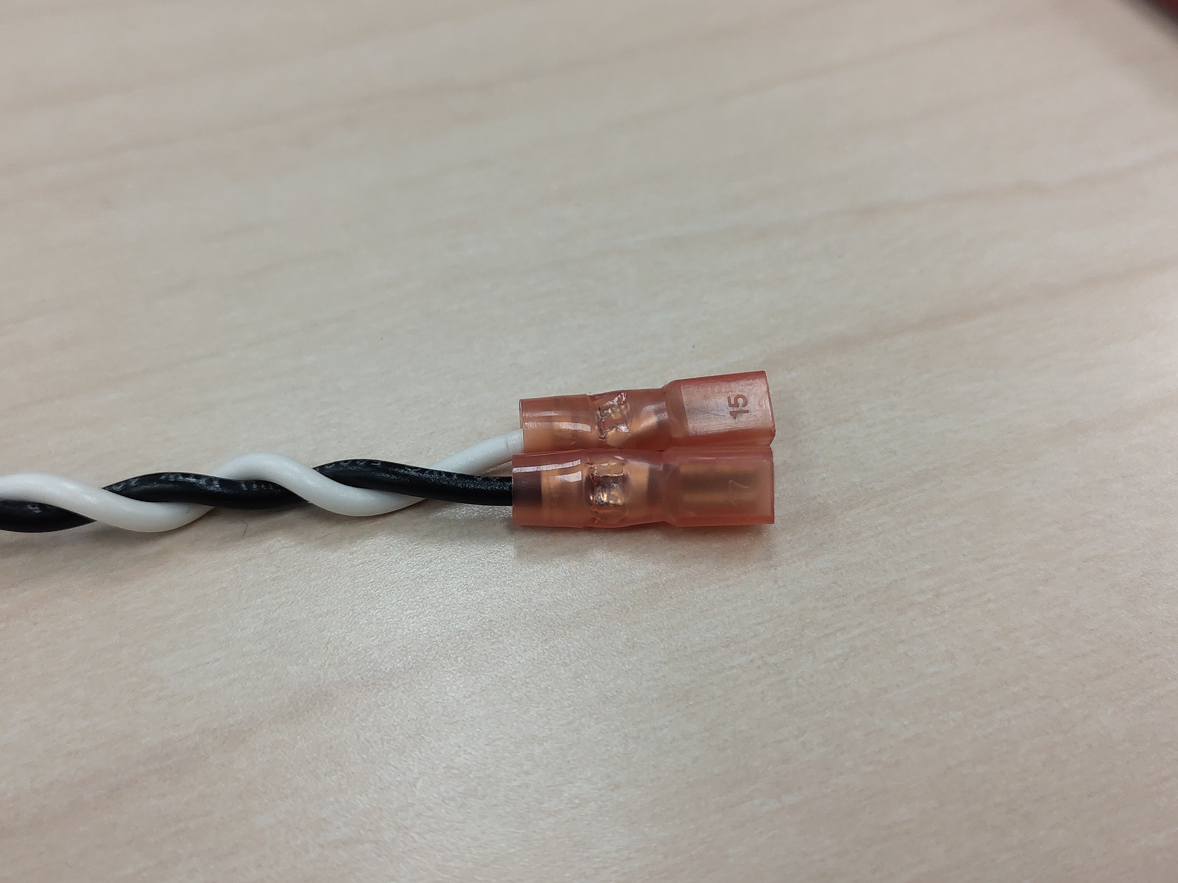 Finished gate-emitter pair with both quick-disconnect terminals crimped