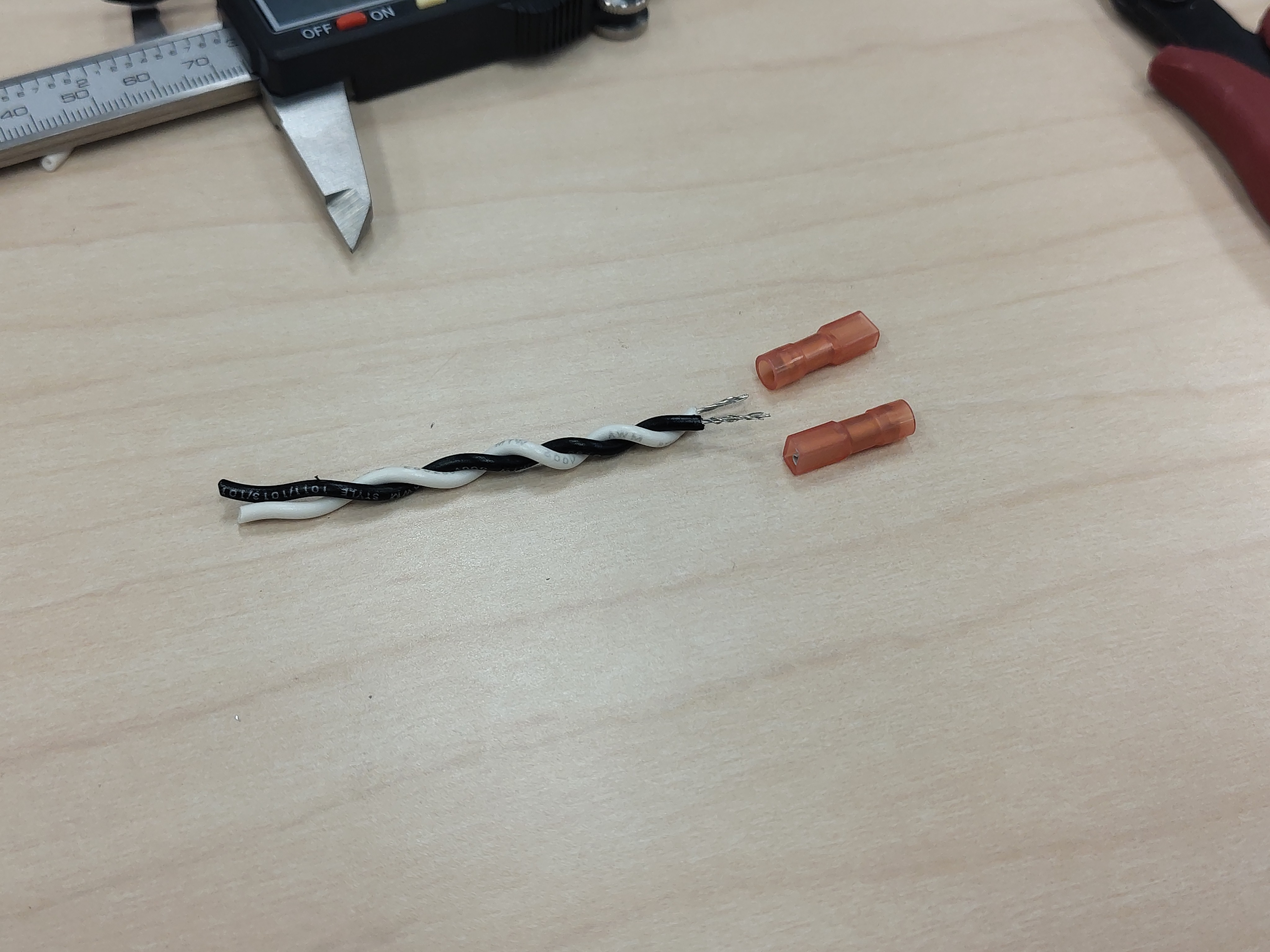 Stripped twisted-pair ends with the quick-disconnect terminals laid out