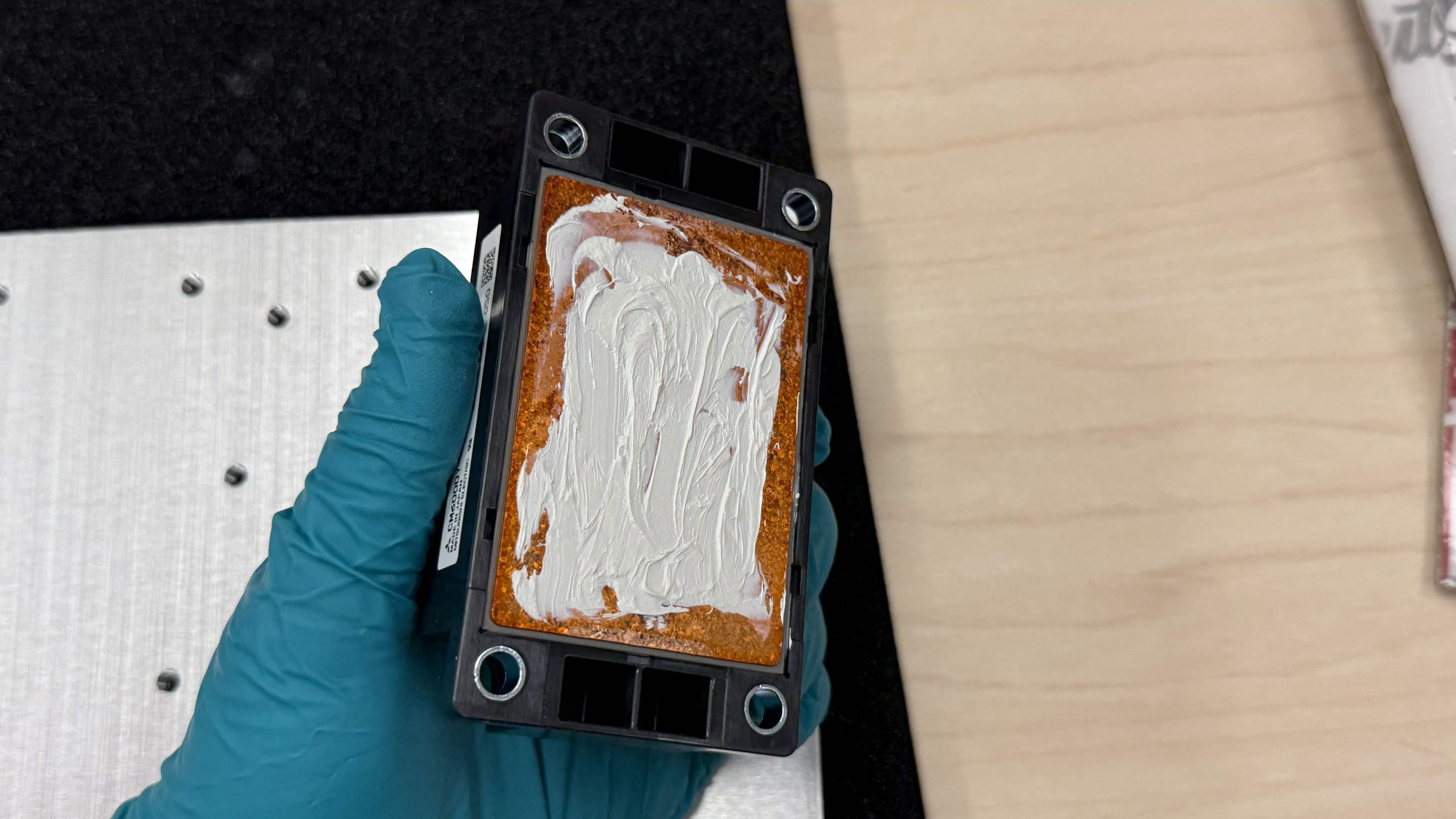 IGBT module base with thermal paste evenly spread