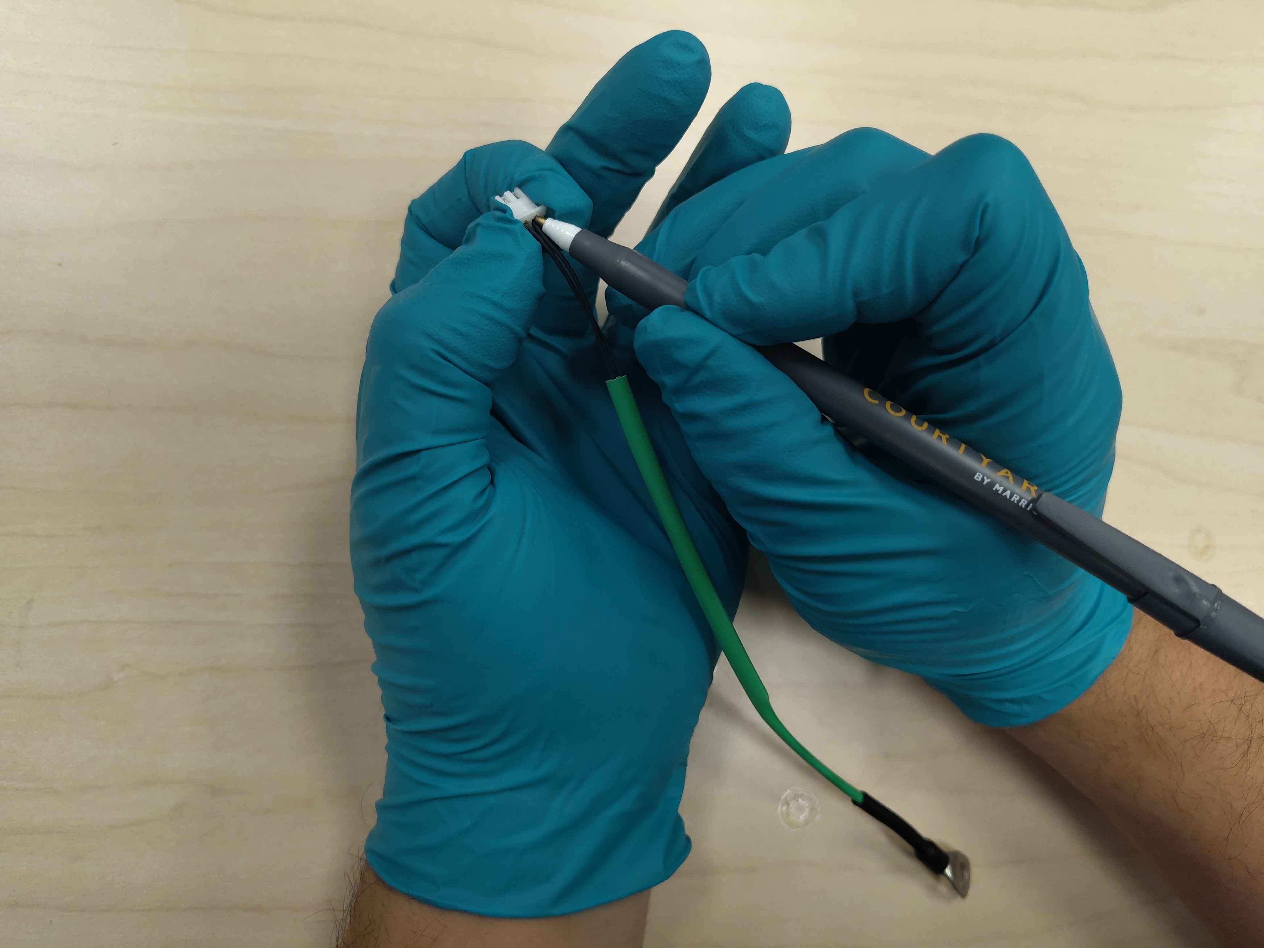 Inserting a crimped terminal into the housing