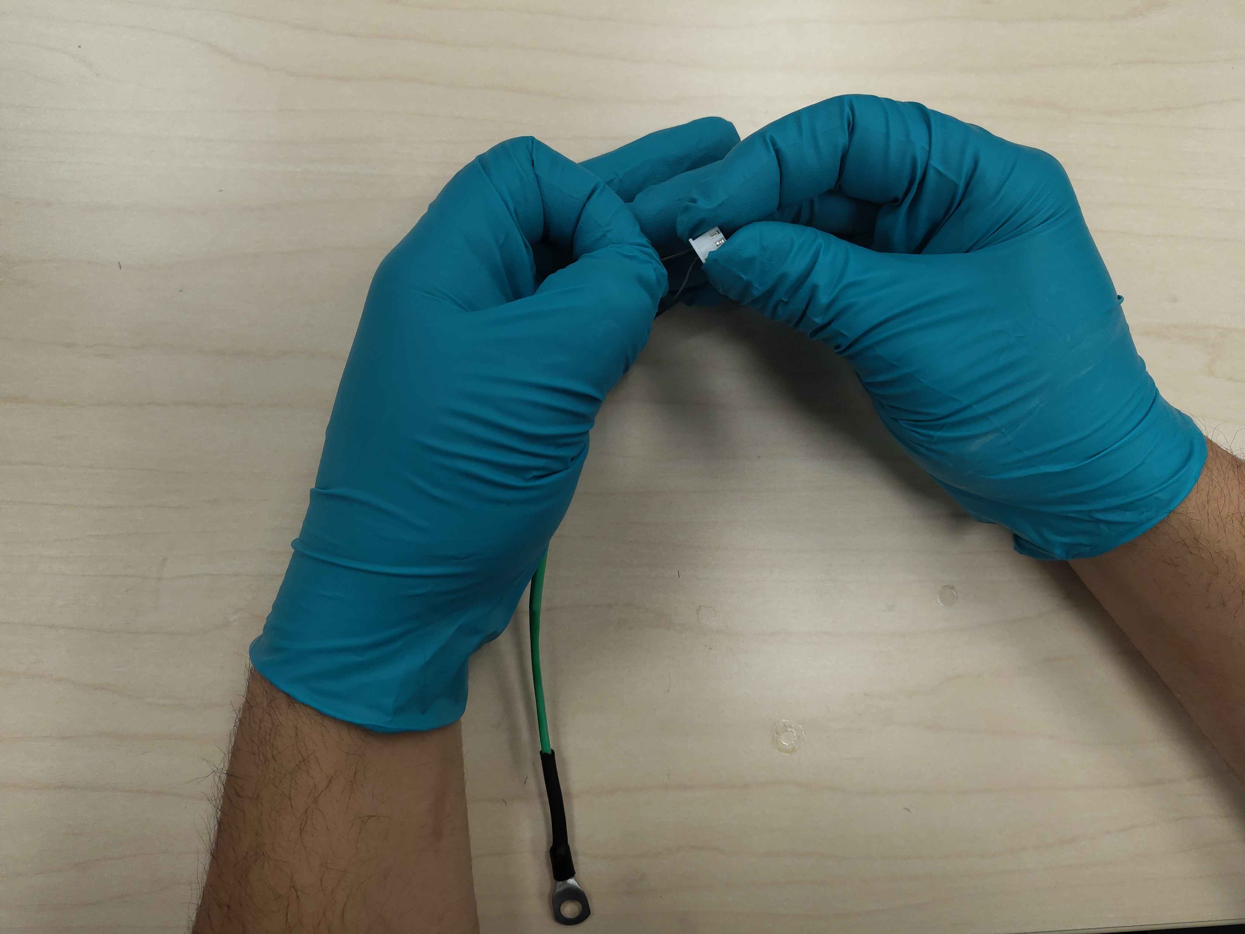 Pull-testing the wires after insertion to verify the locking tang