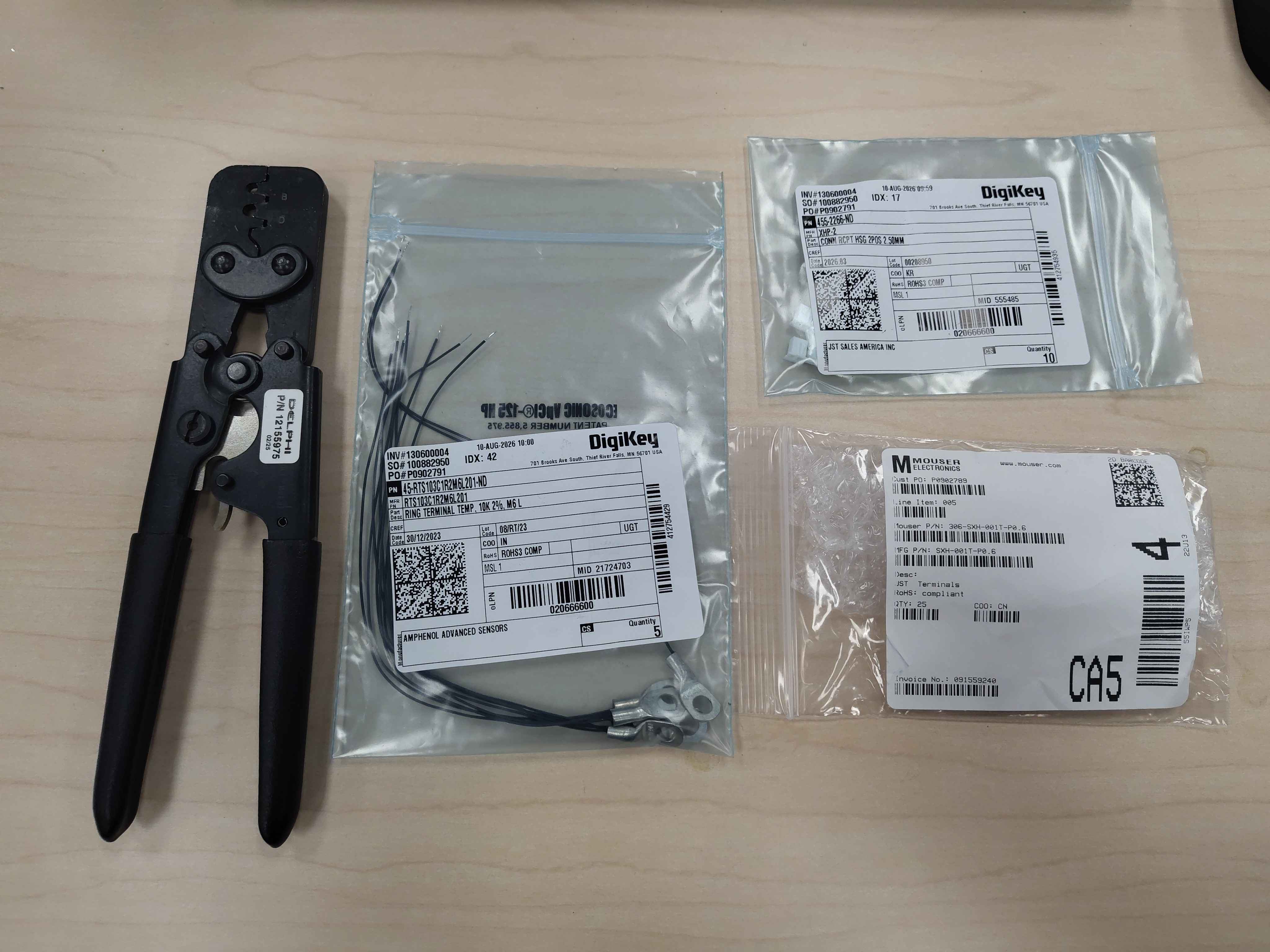Parts laid out for the temperature-sensor harness