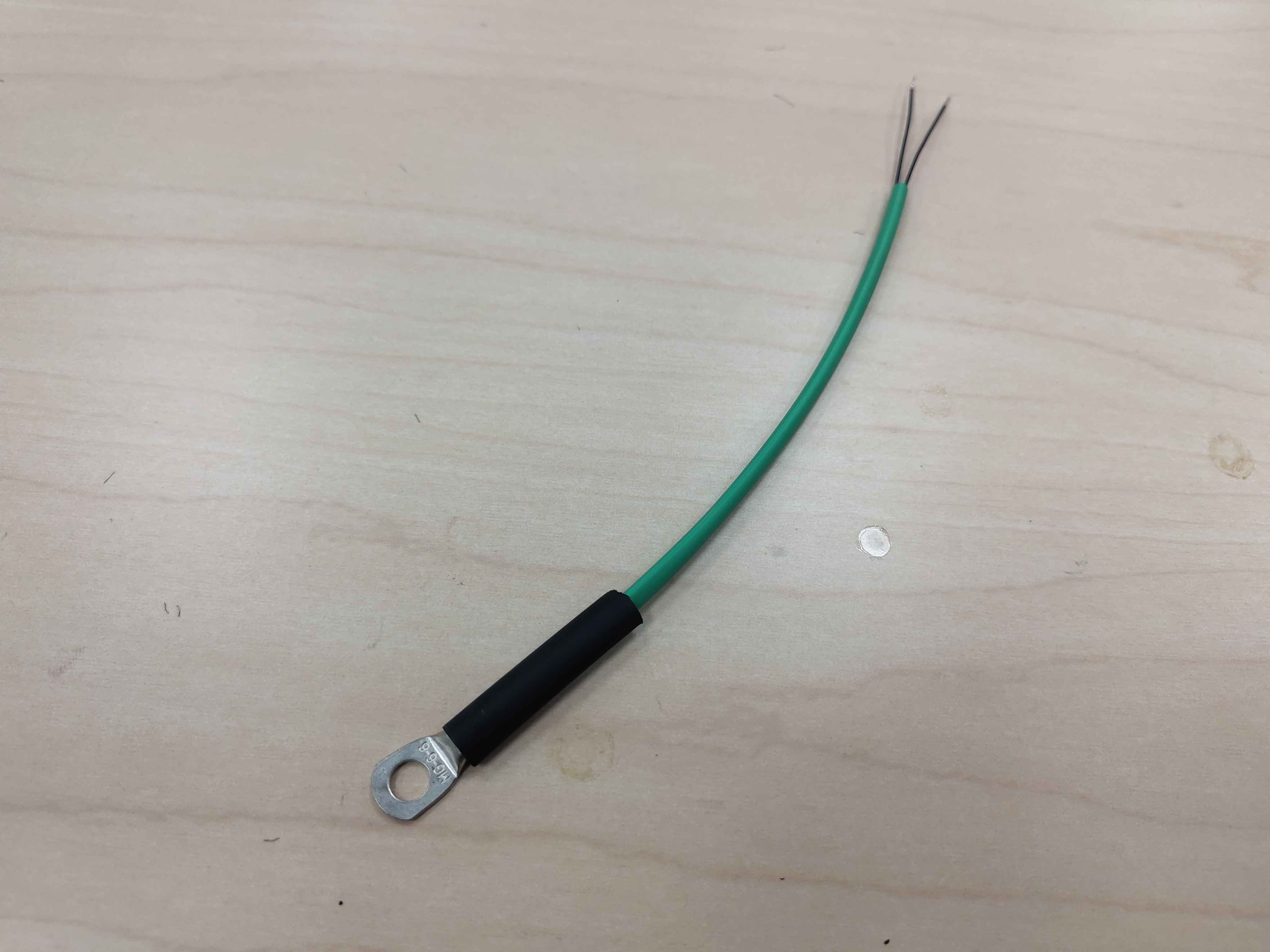 The 1/4 in heat-shrink slid over the ring-lug base