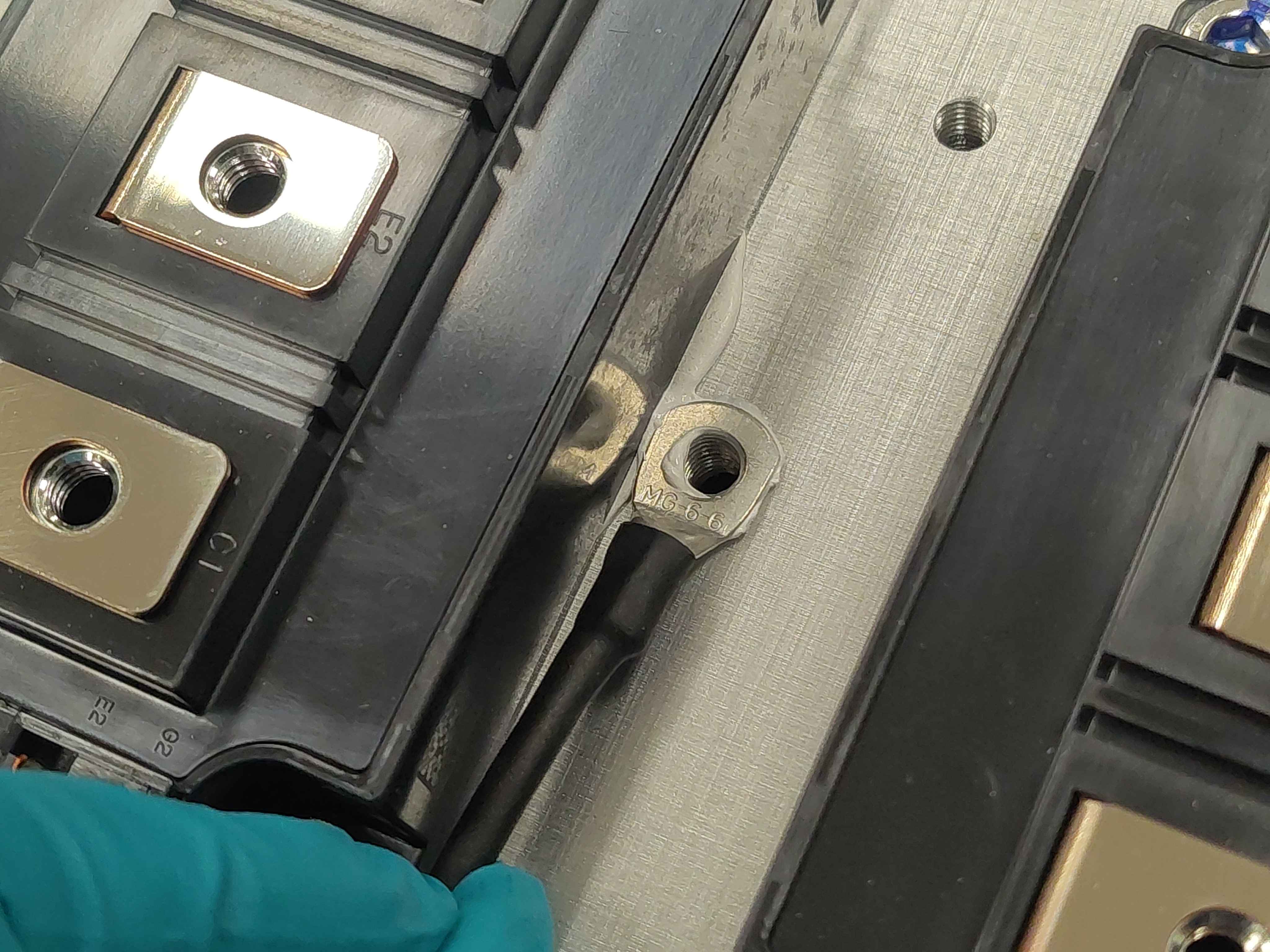 Temperature sensor placed on the heatspreader, aligned with the mounting hole