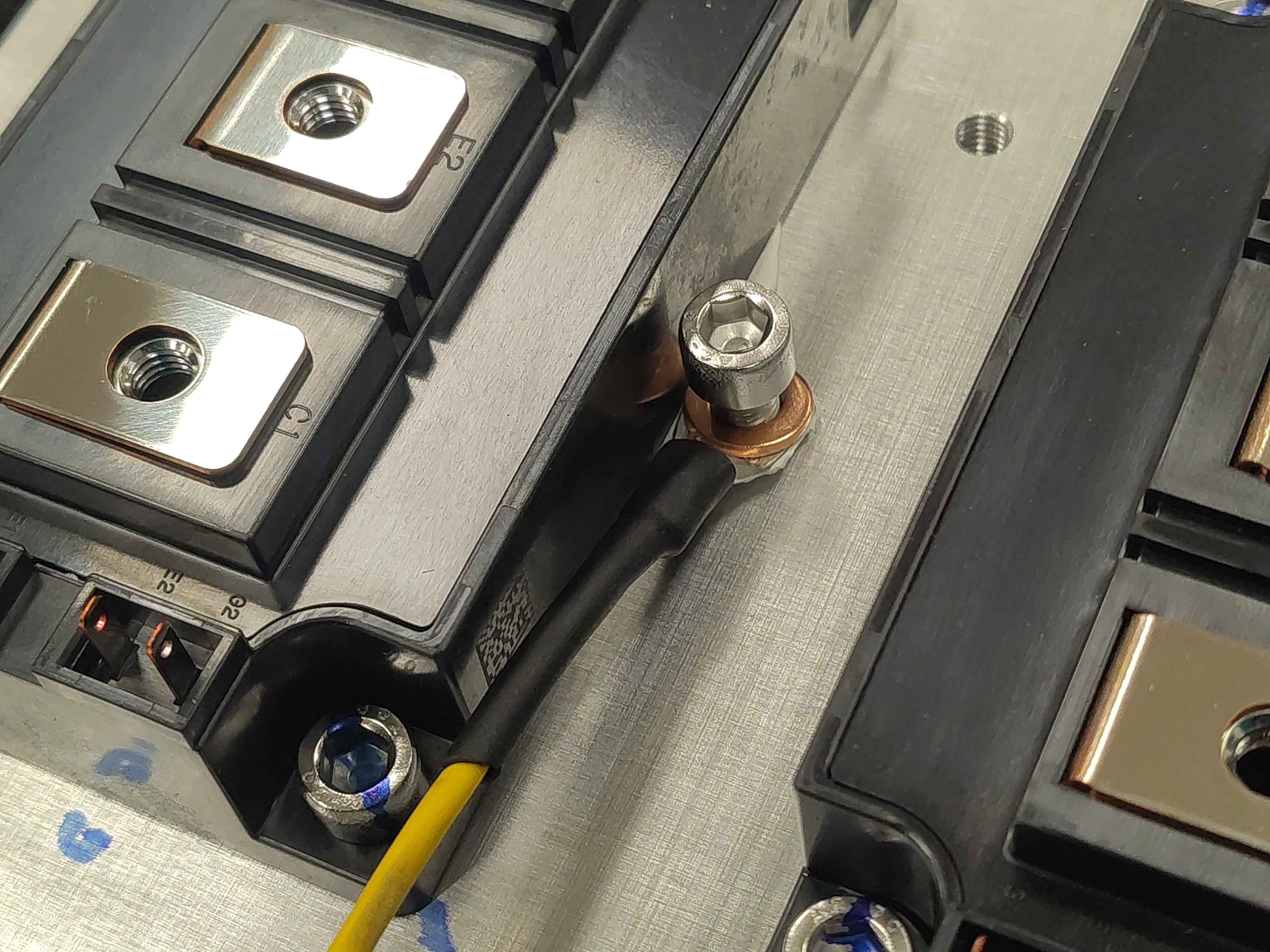 Screw installed through the washer and sensor lug