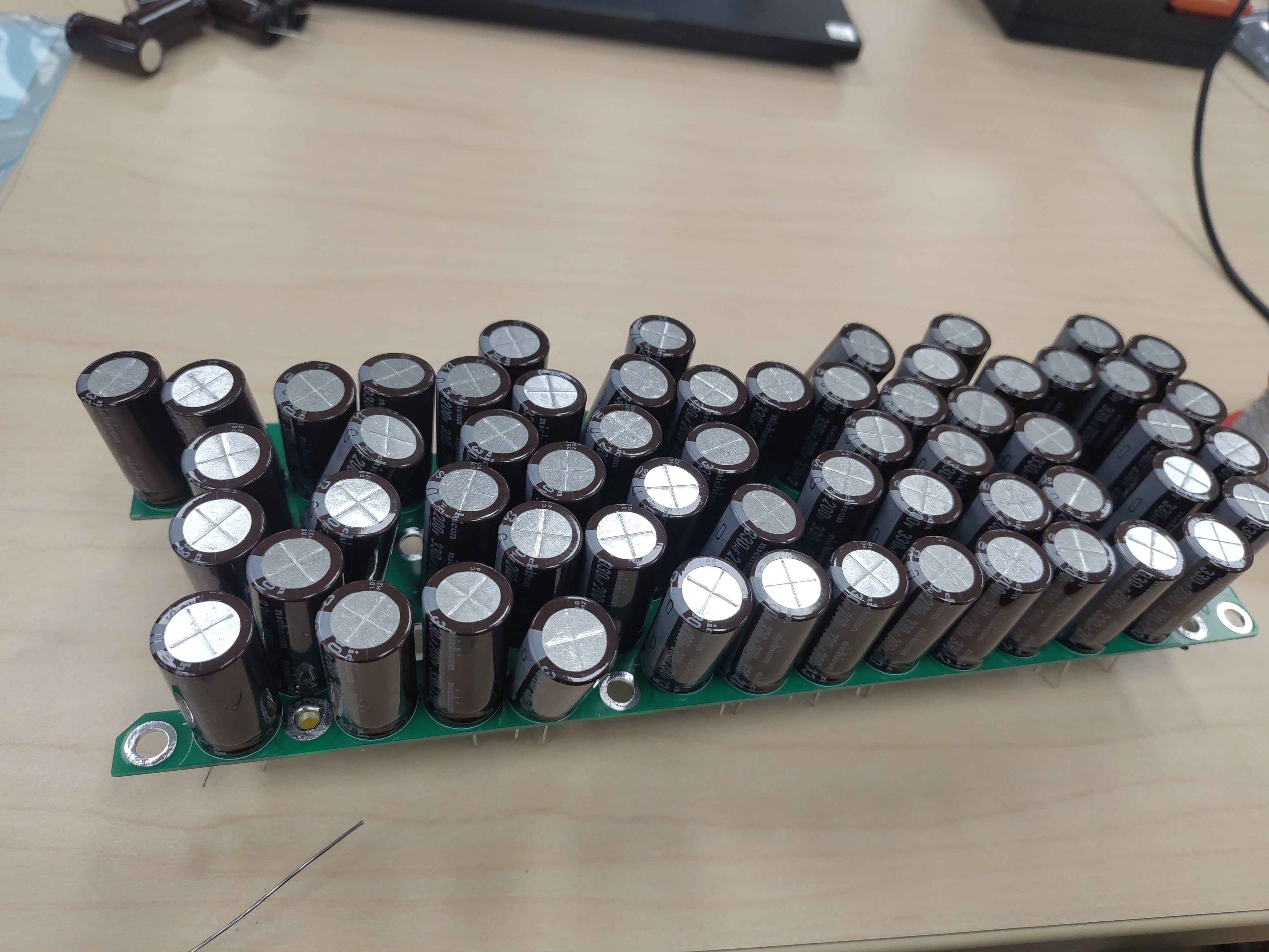 All 60 capacitors inserted on the component side of the board