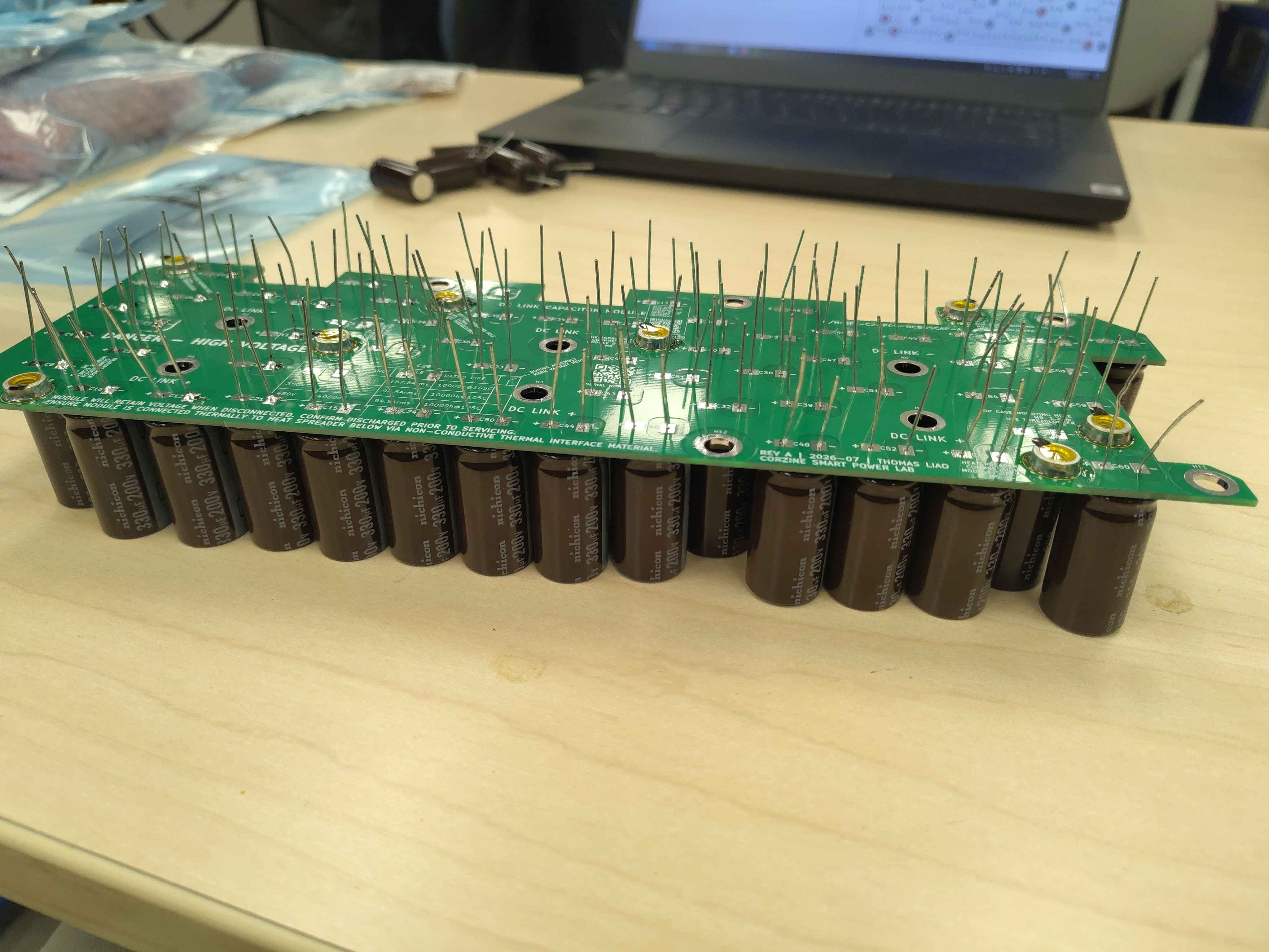 Bottom view showing capacitor leads pushed through the board