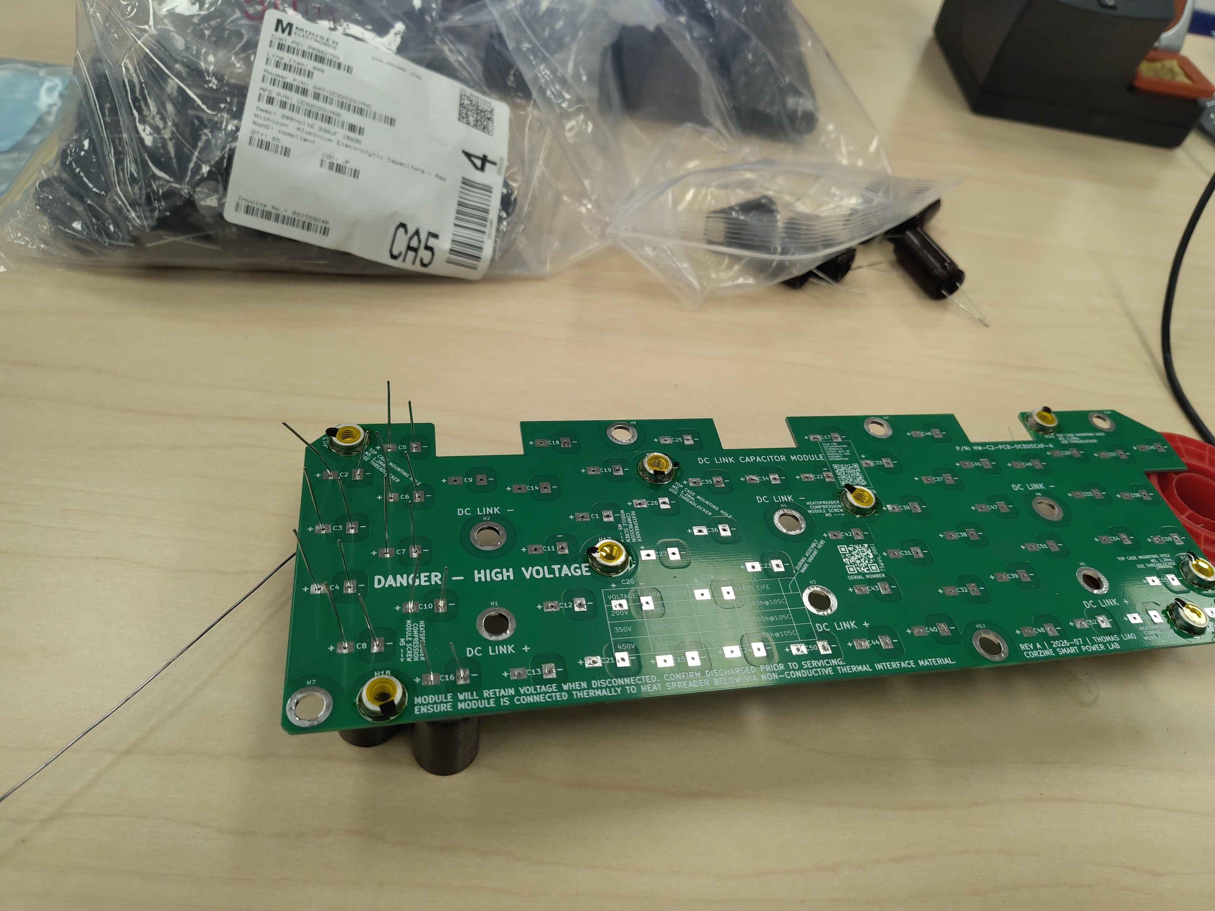 Soldering the standoffs to the mounting pads