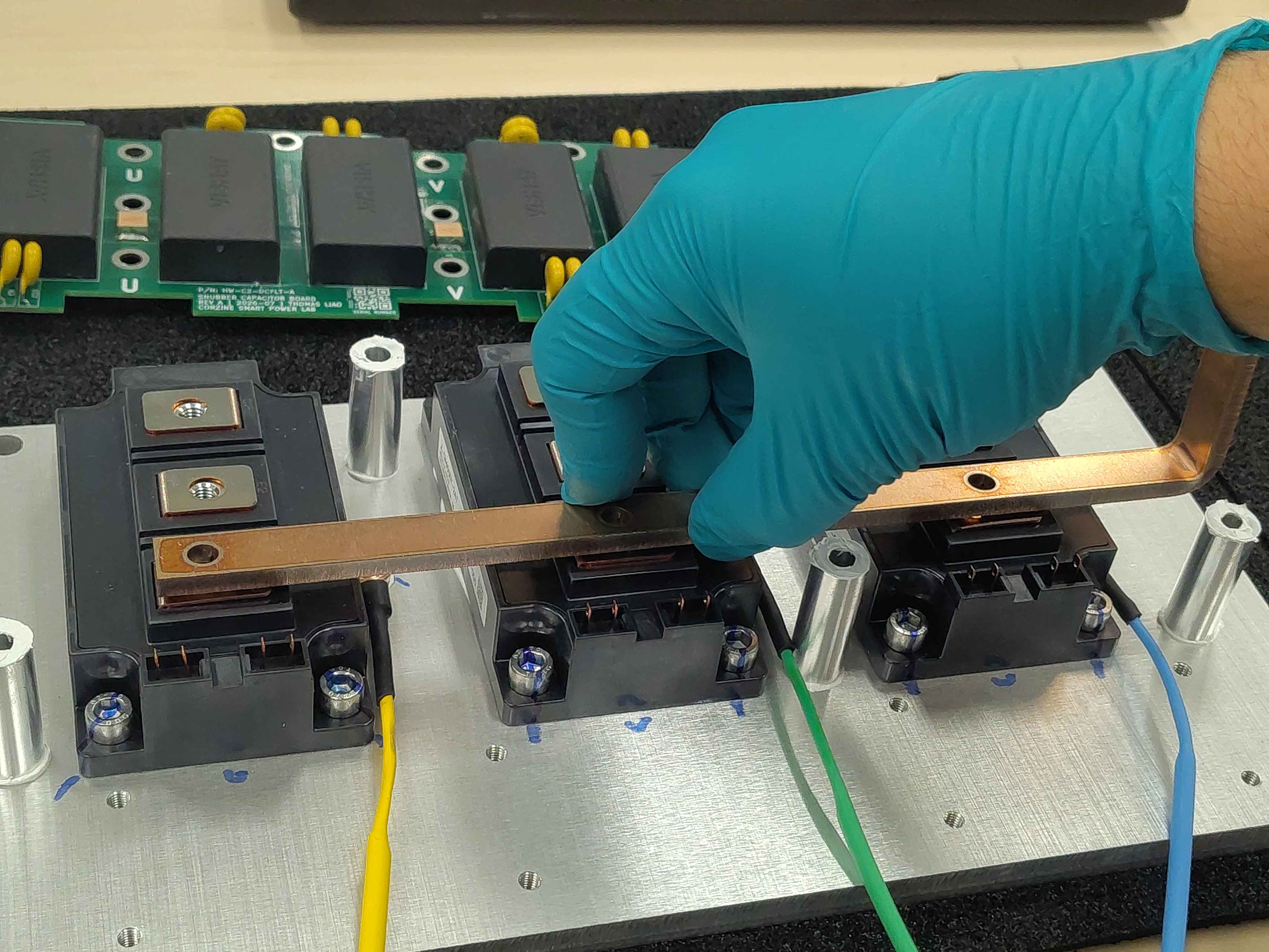 Placing the DC-link bus bars onto the IGBT modules