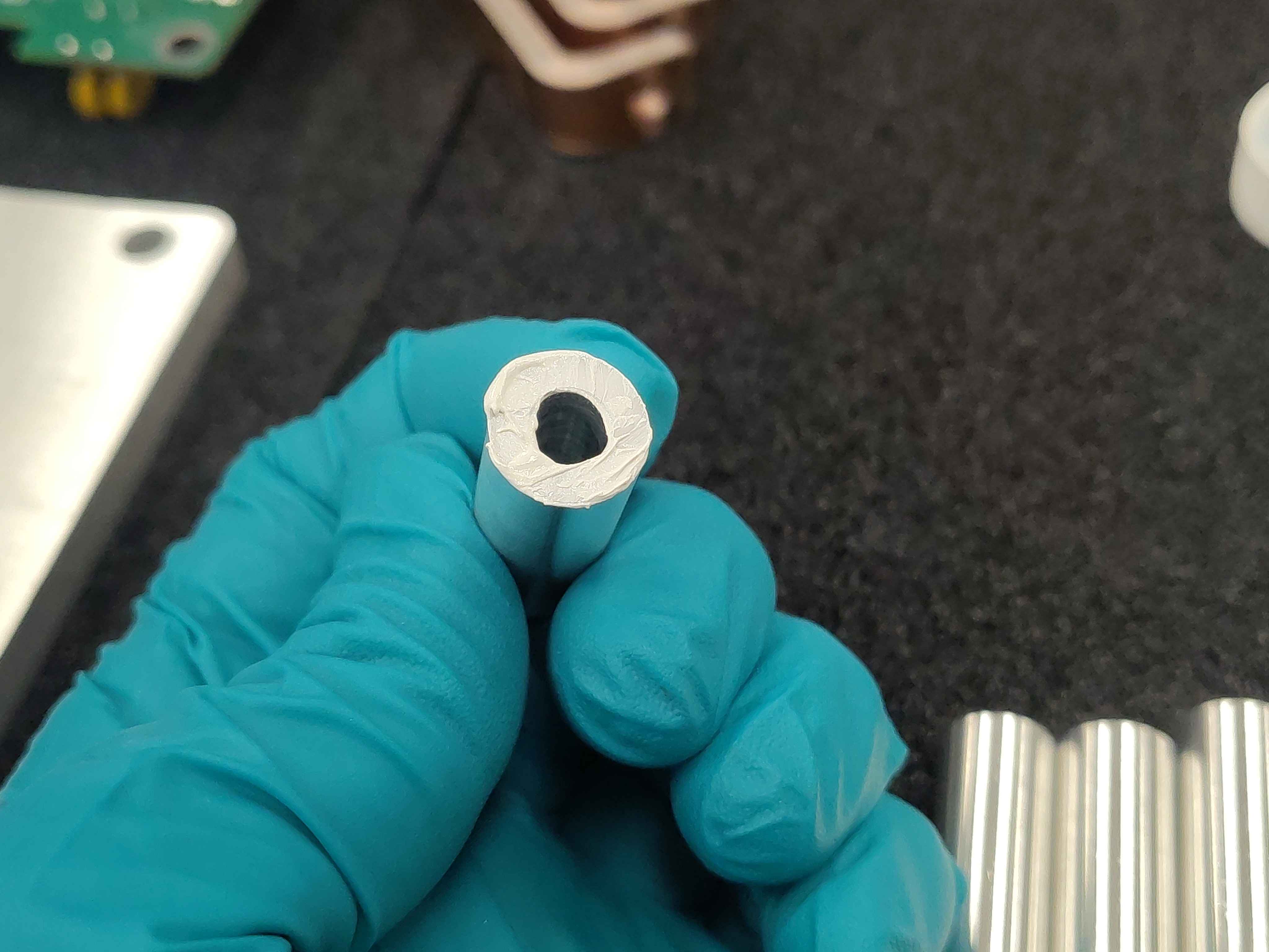 Thermal paste applied to the bottom of a spacer