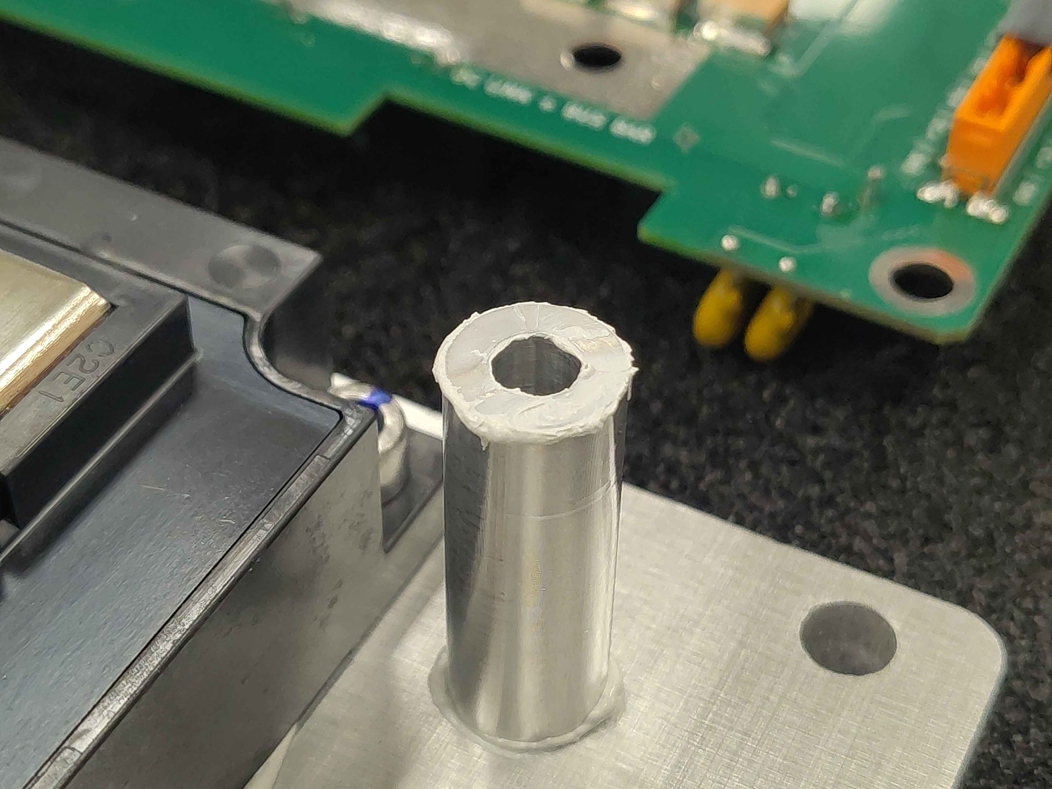 Close-up of thermal paste on the top of a spacer