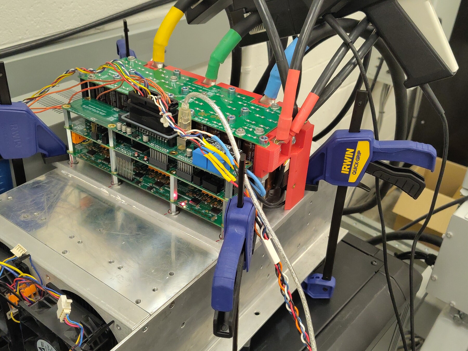 Bench setup with the current clamps on the phase leads