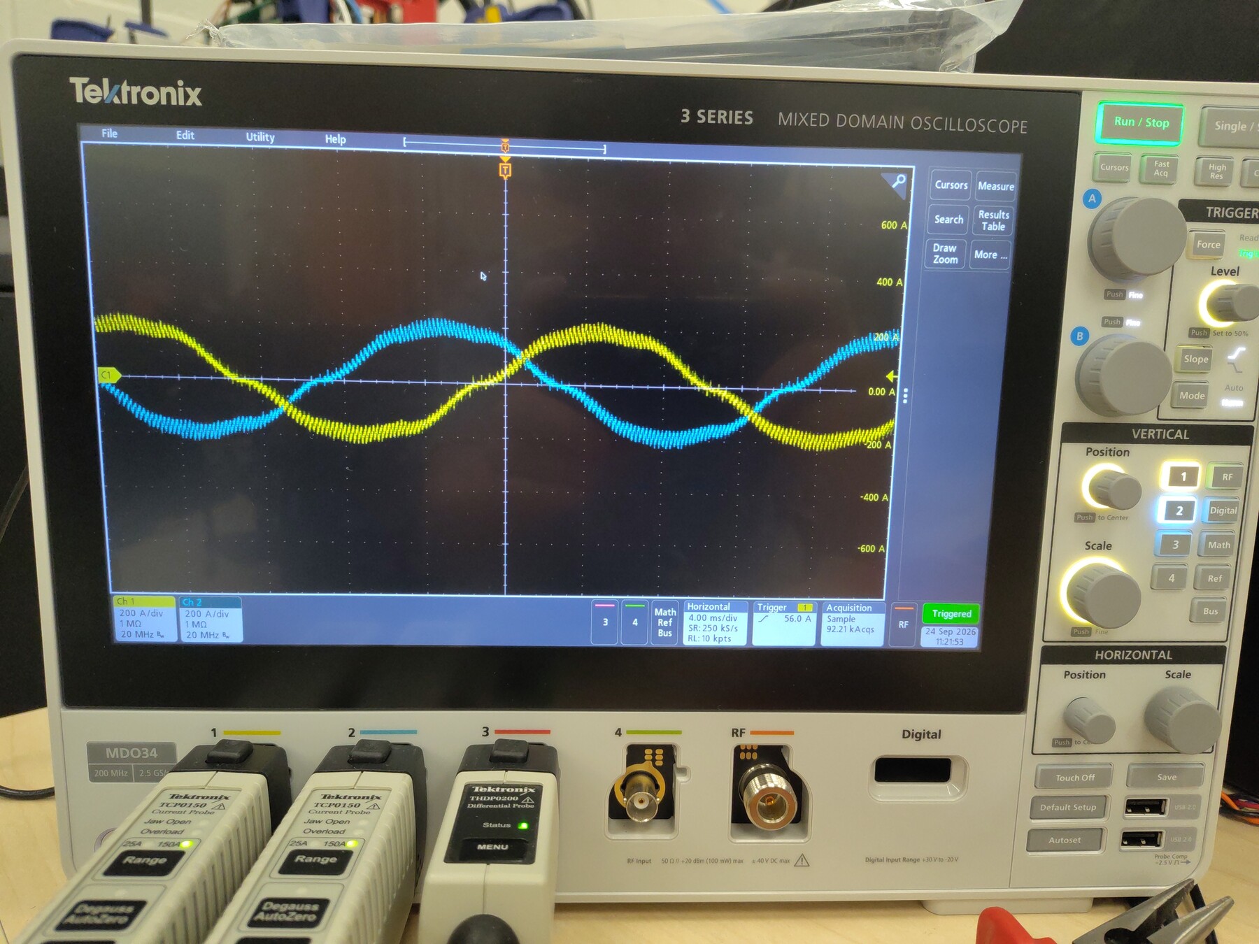 Motoring phase currents on the oscilloscope — clean sine waves, no clamp artifacts